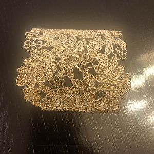 Gold plated cuff bracelet.